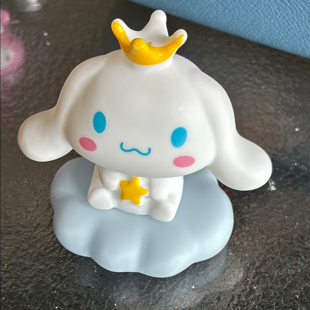 White and Blue Toy Figure